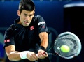 ドバイ・テニス選手権（Dubai Duty Free Tennis Championships 2014）、男子シングルス1回戦。リターンを打つノバク・ジョコビッチ（Novak Djokovic、2014年2月25日撮影）。(c)AFP/MARWAN NAAMANI