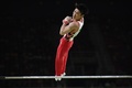 リオデジャネイロ五輪、体操男子予選。鉄棒の演技に臨む内村航平（2016年8月6日撮影）。(c)AFP/Ben STANSALL