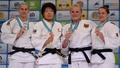 第33回世界柔道選手権、女子78キロ級。表彰式に臨む（左から）銀メダリストのアナマリ・ベレンシェク、優勝した梅木真美、銅メダリストのルイーズ・マルツァンとマリンド・フェルケルク（2015年8月28日撮影）。(c)AFP/VASILY MAXIMOV