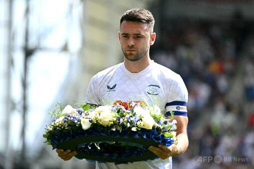 リバプールが親善試合 「チャンピオン」ジョタ選手たたえる 写真10枚