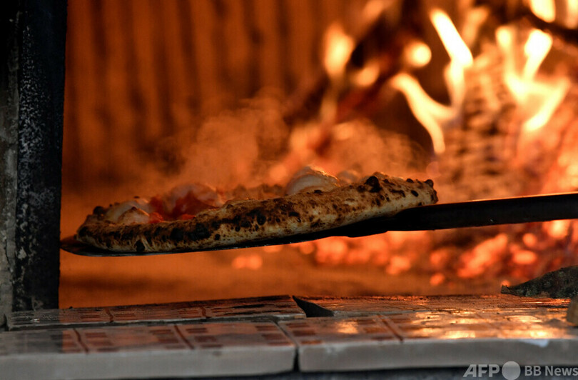 ピザの「フランベ」試み火災、2人死亡 スペイン