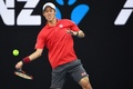 全豪オープンテニス、男子シングルス4回戦。フォアハンドを打つ錦織圭（2017年1月22日撮影）。(c)AFP/SAEED KHAN