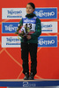 ノルディックスキー世界選手権2013（Nordic World Ski Championships 2013）は22日、イタリアのバルディフィエメ（Val di Fiemme）でジャンプ女子の個人ノーマルヒルが行われ、W杯総合優勝を決めた高梨沙羅（Sara Takanashi）は2位に入り、銀メダルを獲得した。

表彰式に臨む高梨沙羅（2013年2月22日撮影）。(c)AFP/PIERRE TEYSSOT