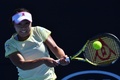 全豪オープンテニス、女子シングルス1回戦。リターンを打つ奈良くるみ（2018年1月16日撮影）。(c)AFP/Paul Crock