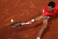 全仏オープンテニス、男子シングルス準々決勝。リターンを打つノバク・ジョコビッチ（2022年5月31日撮影）。(c)Anne-Christine POUJOULAT / AFP