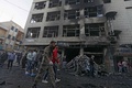 シリア北東部カミシリで起きた同時爆発の現場（2019年11月11日撮影）。(c)Delil souleiman / AFP