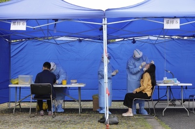 PCR検査が容疑者も「発見」 中国で20年以上逃走の殺人容疑者ら次々逮捕