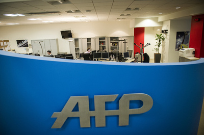 AFP、偽ニュース暴く検証サイト立ち上げへ FBが資金面で支援