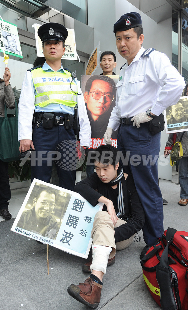 中国の改革訴えた人権活動家に懲役11年、「08憲章」起草の劉暁波氏