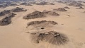 イエメン・マハラ州の砂漠にある「地獄の井戸」として知られる穴（2021年6月6日撮影）。(c)AFP
