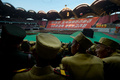 北朝鮮・平壌（Pyongyang）の綾羅島メーデースタジアム（Rungnado May Day Stadium、収容人数15万人）で26日、恒例の「アリラン祭（Arirang Festival）」のマスゲームが行われた。

朝鮮戦争の休戦60周年をテーマに行われる今年のマスゲームには約10万人が参加。一糸乱れぬ体操やダンス、アクロバットなどの集団パフォーマンスや演劇などが披露される（2013年7月26日撮影）。(c)AFP/Ed Jones