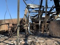ミサイル攻撃を受けて損傷した、米軍などが駐留するイラクのアサド空軍基地（2020年1月13日撮影）。(c)Ayman HENNA / AFP