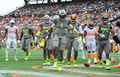 NFLプロボウル2014（NFL Pro Bowl 2014）。タッチダウンを決めて喜ぶチーム・サンダースのQBキャム・ニュートン（Cam Newton、中央、2014年1月26日撮影）。(c)AFP/Getty Images/Scott Cunningham