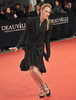 フランス北西部のリゾート地ドービル（Deauville）で4日から13日まで第35回ドービル・アメリカ映画祭（Deauville American Film Festival）が開催され、期間中多くのハリウッドスターが姿を見せた。写真は、映画『The Private Lives of Pippa Lee』の上映会に出席した女優ロビン・ライト・ペン（Robin Wright Penn、2009年9月10日撮影）。(c)AFP/MYCHELE DANIAU