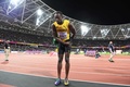 第16回世界陸上ロンドン大会、男子100メートル決勝。レース後、観客にお辞儀するウサイン・ボルト（2017年8月5日撮影）。(c)AFP/Kirill KUDRYAVTSEV