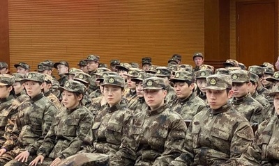 目的は「東京五輪に向けて最後の仕上げ」 中国卓球代表が軍事訓練に参加