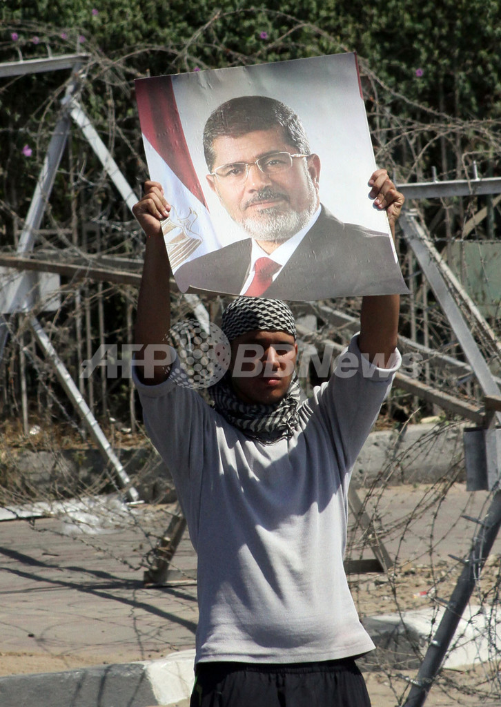 ムスリム同胞団、80年経て手にした政権の座ははかなく エジプト 写真4枚 国際ニュース:AFPBB News