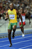 第12回世界陸上ベルリン大会（%%12th IAAF World Championships in Athletics Berlin%%）男子4×100メートルリレー決勝。ジャマイカが37秒31の大会新記録で優勝した。37秒62でトリニダード・トバゴが2位に、38秒02で英国が3位に入った。日本は38秒30で4位に入り、惜しくもメダル獲得を逃した。

　ウサイン・ボルト（%%Usain Bolt%%）は、第3走者としてジャマイカの金メダル獲得に貢献し、%%北京五輪%%に続き世界選手権でも短距離（100メートル、200メートル、4×100メートルリレー）3冠に輝いた。写真は男子4×100メートルリレー決勝に出場するアサファ・パウエル（%%Asafa Powell%%）。（2009年8月22日撮影）(c)AFP/OLIVIER MORIN