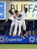 14MLB、ニューヨーク・ヤンキース（New York Yankees）対ボルチモア・オリオールズ（Baltimore Orioles）。試合に勝利し喜ぶボルチモア・オリオールズの選手（2014年4月9日撮影）。(c)AFP/Getty Images/Jim McIsaac