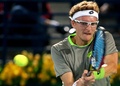 ドバイ・テニス選手権（Dubai Duty Free Tennis Championships 2014）、男子シングルス1回戦。リターンを狙うデニス・イストミン（Denis Istomen、2014年2月25日撮影）。(c)AFP/MARWAN NAAMANI