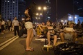 香港（Hong Kong）の金鐘（アドミラルティ、Admiralty）地区に集まったデモ参加者ら（2014年10月10日撮影）。(c)AFP/Ed Jones