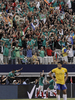 サッカー国際親善試合は3日、各地で行われ、ブラジルはメキシコに0-2で敗れた。

前半21分に先制点を決め、歓喜するメキシコのジオバンニ・ドスサントス（Giovanni Dos Santos、中央、2012年6月3日撮影）。(c)AFP/Getty Images/Brandon Wade