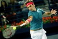 ドバイ・テニス選手権（Dubai Duty Free Tennis Championships 2014）、男子シングルス準決勝。リターンを打つロジャー・フェデラー（Roger Federer、2014年2月28日撮影）。(c)AFP/MARWAN NAAMANI