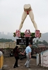 中国南部の重慶（Chongqing）で建設中の同国初の「性」を題材としたテーマパーク「ラブ・ランド（Love Land）」に設置された、下着姿の女性の下半身の巨大な回転像（2009年5月15日撮影）。(c)AFP