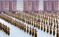 中国・河南（%%Henan%%）省で始まった第9回鄭州国際少林武術フェスティバル（Zhengzhou International Shaolin Wushu Festival）開会式で演武する少林寺塔溝武術学校（Shaolin Tagou Wushu School）の生徒たち（2012年10月21日撮影）。(c)AFP