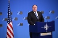 ベルギーの首都ブリュッセルでの北大西洋条約機構（NATO）加盟国外相会議後、記者会見するマイク・ポンペオ米国務長官（2018年12月4日撮影）。(c)JOHN THYS / AFP