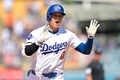 24MLB、ロサンゼルス・ドジャース対サンフランシスコ・ジャイアンツ。8回にソロ本塁打を放ち、喜ぶロサンゼルス・ドジャースの大谷翔平（2024年7月25日撮影）。(c)Jayne Kamin-Oncea/Getty Images/AFP
