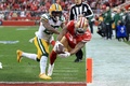 19NFL、NFC決勝、サンフランシスコ・フォーティナイナーズ対グリーンベイ・パッカーズ。タッチダウンを決めるサンフランシスコ・フォーティナイナーズのラヒーム・モスタート（右、2020年1月19日撮影）。(c)Sean M. Haffey/Getty Images/AFP