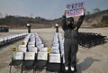 韓国ソウルで行われた脱原発デモ（2021年3月11日撮影）。(c)Jung Yeon-je / AFP
