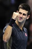 英ロンドン（London）で、ATPワールドツアー・ファイナル（ATP World Tour Finals 2012）の準決勝を制し、ガッツポーズをみせるセルビアのノバク・ジョコビッチ（Novak Djokovic、2012年11月10日撮影）。(c)AFP/GLYN KIRK