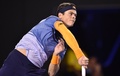 全豪オープンテニス、男子シングルス準々決勝。サーブを打つミロス・ラオニッチ（2016年1月27日撮影）。(c)AFP/PETER PARKS
