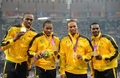 ロンドン五輪は11日、オリンピックスタジアム（Olympic Stadium）で陸上男子4×100メートルリレー決勝が行われ、ジャマイカが世界新記録の36秒84で金メダルを獲得した。

表彰式に臨むジャマイカの（左から）ウサイン・ボルト（Usain Bolt）、ヨハン・ブレイク（Yohan Blake）、マイケル・フレイター（Michael Frater）、ネスタ・カーター（Nesta Carter、2012年8月11日撮影）。(c)AFP/JOHANNES EISELE