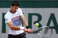 全仏オープンテニス、男子シングルス準々決勝。リターンを打つノバク・ジョコビッチ（2017年6月7日撮影）。(c)AFP/Thomas SAMSON