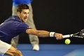 全豪オープンテニス、男子シングルス決勝。リターンを狙うノバク・ジョコビッチ（2016年1月31日撮影）。(c)AFP/PAUL CROCK