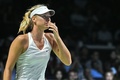 女子テニス、WTAツアー選手権（BNP Paribas WTA Championships - Singapore 2014）4日目。試合に臨むマリア・シャラポワ（Maria Sharapova、2014年10月23日撮影）。(c)AFP/ROSLAN RAHMAN