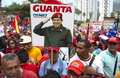ベネズエラの首都カラカス（Caracas）に集まったウゴ・チャベス（Hugo Chavez）大統領の支持者たち（2013年1月23日撮影）。(c)AFP/JUAN BARRETO