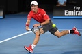 全豪オープンテニス、男子シングルス4回戦。フォアハンドを打つ錦織圭（2017年1月22日撮影）。(c)AFP/SAEED KHAN