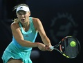 テニス、ドバイ・テニス選手権、女子シングルス準決勝。リターンを打つカロリーネ・ボズニアツキ（2015年2月20日撮影）。(c)AFP/KARIM SAHIB