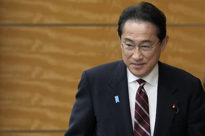 Japan PM's son dismissed as aide over official residence party