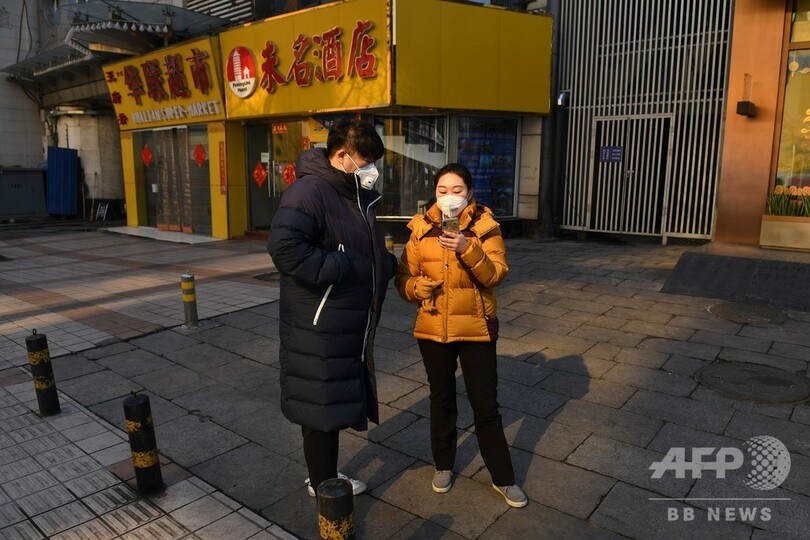 習主席、異例の治療現場視察 WHO、海外感染の広がりに警鐘