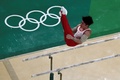 リオデジャネイロ五輪、体操男子予選。平行棒の演技に臨む内村航平（2016年8月6日撮影）。(c)AFP/Antonin THUILLIER