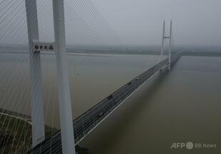 中国当局、重金属の河川流出認める 報道受け