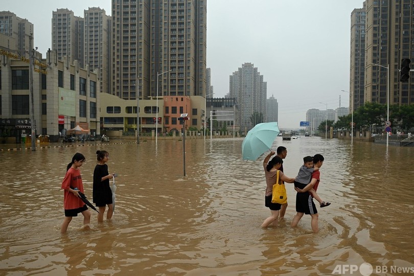 中国中部豪雨、死者51人に