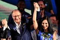 ブラジル・ブラジリアで開かれたブラジル社会民主党（PSDB）の党大会で大統領選への擁立が決まったジェラルド・アルキミン前サンパウロ州知事（左）とルー・アルキミン夫人（右、2018年8月4日撮影）。(c)AFP PHOTO / EVARISTO SA