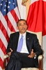 米ニューヨーク（New York）のホテルで菅直人（Naoto Kan）首相（写真外）と会談するバラク・オバマ（Barack Obama）米大統領（2010年9月23日撮影）。(c)AFP/Satoru IIZUKA
