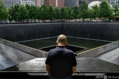 9.11生還者の証言：105階にいた男性──警備員は歌っていた 写真8枚 